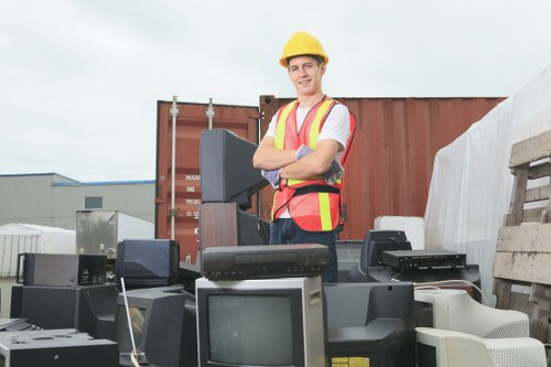 Workers sorting recyclables at a local transfer station